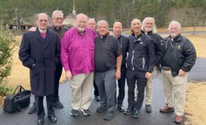 From left to right: Bp. David Simpson, Bp. Michael Davidson, Abp. Charles Jones, Bp. Robert Northwood, Fr. Jimmy House, Bp. Chris Moran, Bp. Brett Crompton, Bp. Jason Epps, Bp. David Epps